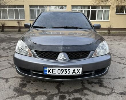 Серый Мицубиси Лансер, объемом двигателя 1.6 л и пробегом 202 тыс. км за 4600 $, фото 1 на Automoto.ua