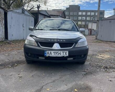 Сірий Міцубісі Lancer, об'ємом двигуна 1.58 л та пробігом 305 тис. км за 3300 $, фото 1 на Automoto.ua