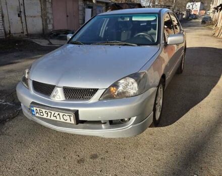 Серый Мицубиси Лансер, объемом двигателя 2 л и пробегом 353 тыс. км за 4800 $, фото 1 на Automoto.ua