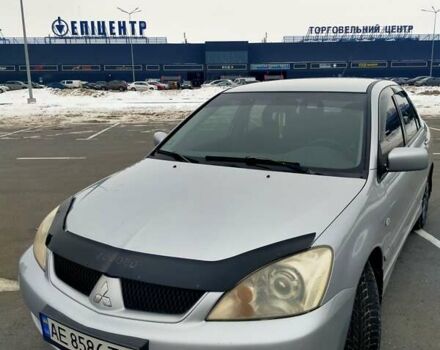Сірий Міцубісі Lancer, об'ємом двигуна 1.58 л та пробігом 298 тис. км за 5100 $, фото 1 на Automoto.ua