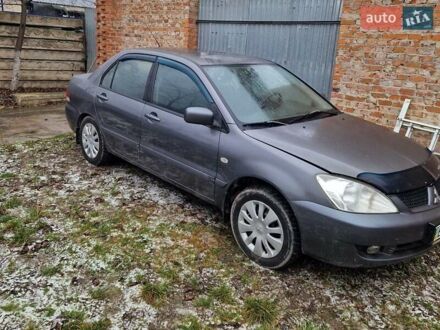 Сірий Міцубісі Lancer, об'ємом двигуна 1.6 л та пробігом 160 тис. км за 3800 $, фото 1 на Automoto.ua