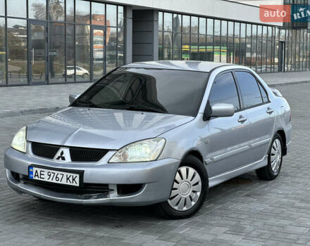 Сірий Міцубісі Lancer, об'ємом двигуна 1.6 л та пробігом 200 тис. км за 3900 $, фото 1 на Automoto.ua