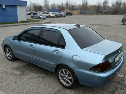 Сірий Міцубісі Lancer, об'ємом двигуна 1.6 л та пробігом 238 тис. км за 4400 $, фото 1 на Automoto.ua
