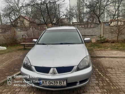 Сірий Міцубісі Lancer, об'ємом двигуна 1.6 л та пробігом 190 тис. км за 4700 $, фото 1 на Automoto.ua