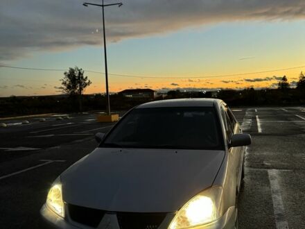 Мицубиси Лансер 2007 в Черновцах на Automoto.ua Серый Мицубиси Лансер, объемом двигателя 1.6 л и пробегом 2 тыс. км за 4700 $, фото 1 на Automoto.ua