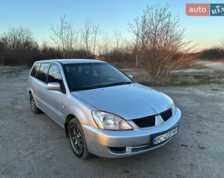 Серый Мицубиси Лансер, объемом двигателя 1.58 л и пробегом 330 тыс. км за 2499 $, фото 1 на Automoto.ua
