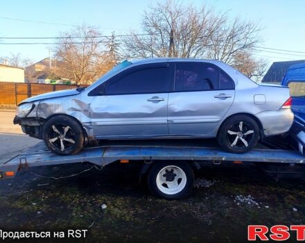 Серый Мицубиси Лансер, объемом двигателя 1.6 л и пробегом 0 тыс. км за 750 $, фото 1 на Automoto.ua