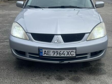 Сірий Міцубісі Lancer, об'ємом двигуна 1.6 л та пробігом 200 тис. км за 4200 $, фото 1 на Automoto.ua