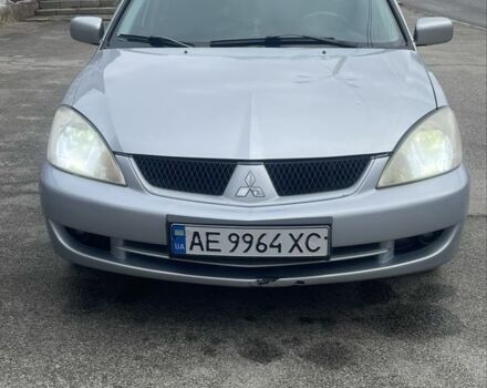 Серый Мицубиси Лансер, объемом двигателя 1.6 л и пробегом 200 тыс. км за 4200 $, фото 1 на Automoto.ua