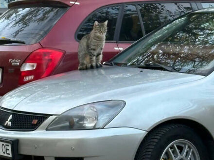 Серый Мицубиси Лансер, объемом двигателя 2 л и пробегом 180 тыс. км за 4000 $, фото 1 на Automoto.ua