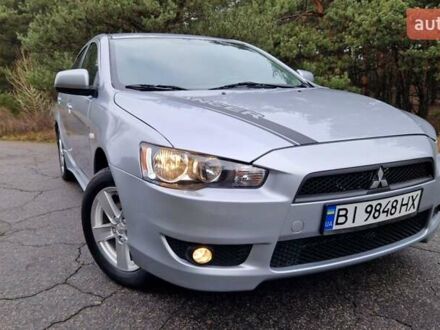 Серый Мицубиси Лансер, объемом двигателя 2 л и пробегом 213 тыс. км за 6550 $, фото 1 на Automoto.ua