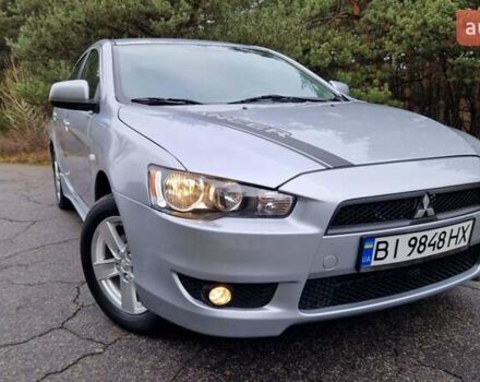 Серый Мицубиси Лансер, объемом двигателя 2 л и пробегом 213 тыс. км за 6550 $, фото 1 на Automoto.ua