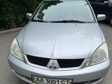 Сірий Міцубісі Lancer, об'ємом двигуна 1.6 л та пробігом 144 тис. км за 4250 $, фото 1 на Automoto.ua