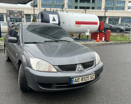Сірий Міцубісі Lancer, об'ємом двигуна 1.6 л та пробігом 242 тис. км за 4200 $, фото 1 на Automoto.ua