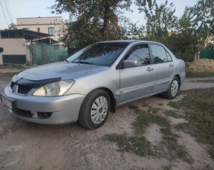 Сірий Міцубісі Lancer, об'ємом двигуна 1.6 л та пробігом 222 тис. км за 3300 $, фото 1 на Automoto.ua