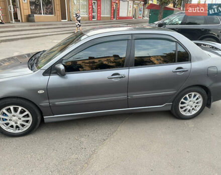 Серый Мицубиси Лансер, объемом двигателя 1.6 л и пробегом 335 тыс. км за 4500 $, фото 1 на Automoto.ua