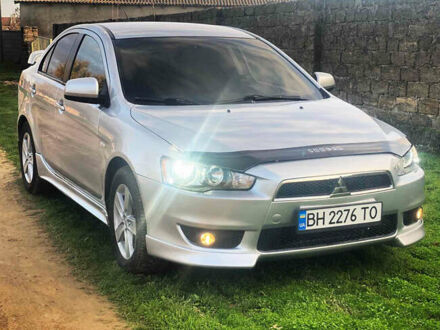 Серый Мицубиси Лансер, объемом двигателя 2 л и пробегом 226 тыс. км за 6200 $, фото 1 на Automoto.ua