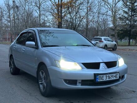 Сірий Міцубісі Lancer, об'ємом двигуна 1.6 л та пробігом 210 тис. км за 4750 $, фото 1 на Automoto.ua