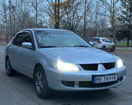 Серый Мицубиси Лансер, объемом двигателя 1.6 л и пробегом 210 тыс. км за 4750 $, фото 1 на Automoto.ua