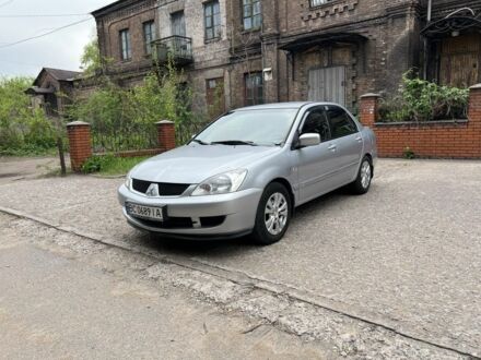 Сірий Міцубісі Lancer, об'ємом двигуна 1.6 л та пробігом 276 тис. км за 4200 $, фото 1 на Automoto.ua