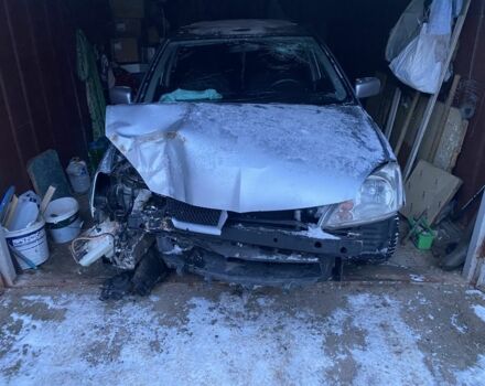 Серый Мицубиси Лансер, объемом двигателя 1.6 л и пробегом 314 тыс. км за 2500 $, фото 1 на Automoto.ua