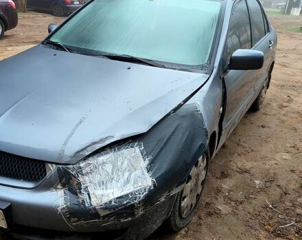 Сірий Міцубісі Lancer, об'ємом двигуна 1.6 л та пробігом 197 тис. км за 2200 $, фото 1 на Automoto.ua