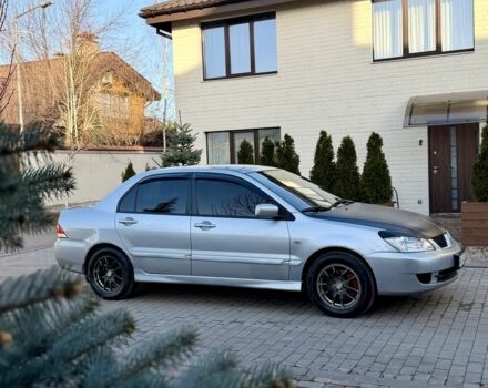 Серый Мицубиси Лансер, объемом двигателя 1.6 л и пробегом 273 тыс. км за 3600 $, фото 1 на Automoto.ua