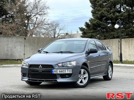 Сірий Міцубісі Lancer, об'ємом двигуна 2 л та пробігом 217 тис. км за 6650 $, фото 1 на Automoto.ua