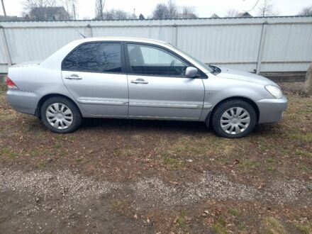 Мицубиси Лансер 2007 в Днепре (Днепропетровске) на Automoto.ua Серый Мицубиси Лансер, объемом двигателя 1.6 л и пробегом 220 тыс. км за 4000 $, фото 1 на Automoto.ua