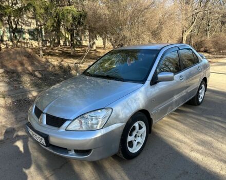 Серый Мицубиси Лансер, объемом двигателя 1.6 л и пробегом 220 тыс. км за 3600 $, фото 1 на Automoto.ua