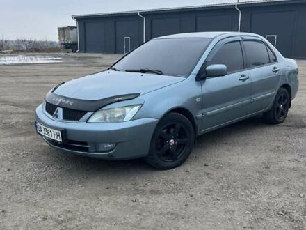 Сірий Міцубісі Lancer, об'ємом двигуна 1.58 л та пробігом 341 тис. км за 4500 $, фото 1 на Automoto.ua