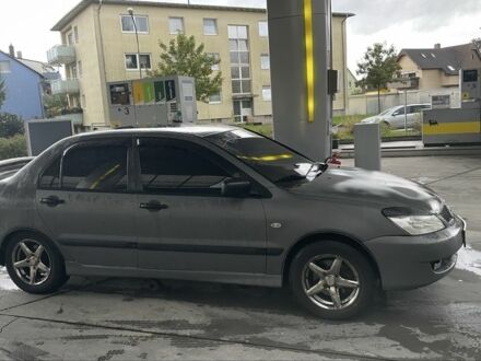 Мицубиси Лансер 2007 в Харькове на Automoto.ua Серый Мицубиси Лансер, объемом двигателя 1.6 л и пробегом 175 тыс. км за 4500 $, фото 1 на Automoto.ua