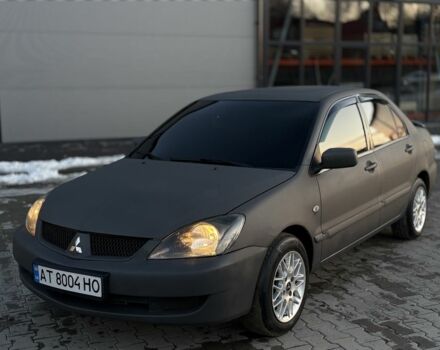 Сірий Міцубісі Lancer, об'ємом двигуна 1.6 л та пробігом 250 тис. км за 3750 $, фото 1 на Automoto.ua