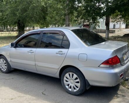 Сірий Міцубісі Lancer, об'ємом двигуна 1.6 л та пробігом 270 тис. км за 3800 $, фото 1 на Automoto.ua