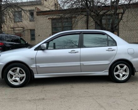 Сірий Міцубісі Lancer, об'ємом двигуна 1.6 л та пробігом 347 тис. км за 4500 $, фото 1 на Automoto.ua