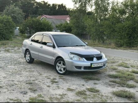 Серый Мицубиси Лансер, объемом двигателя 1.6 л и пробегом 197 тыс. км за 4200 $, фото 1 на Automoto.ua