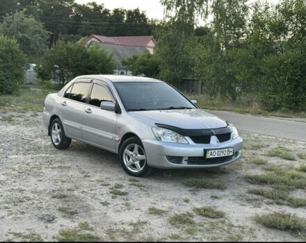 Сірий Міцубісі Lancer, об'ємом двигуна 1.6 л та пробігом 197 тис. км за 4300 $, фото 1 на Automoto.ua
