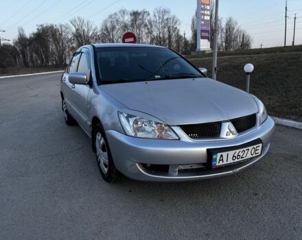 Серый Мицубиси Лансер, объемом двигателя 1.6 л и пробегом 217 тыс. км за 3300 $, фото 1 на Automoto.ua