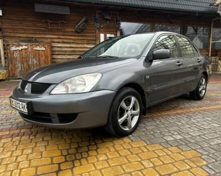 Сірий Міцубісі Lancer, об'ємом двигуна 1.6 л та пробігом 213 тис. км за 2400 $, фото 1 на Automoto.ua