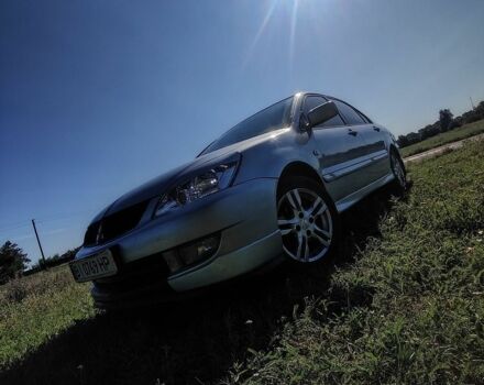 Сірий Міцубісі Lancer, об'ємом двигуна 1.58 л та пробігом 240 тис. км за 3200 $, фото 1 на Automoto.ua