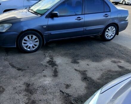 Серый Мицубиси Лансер, объемом двигателя 1.6 л и пробегом 0 тыс. км за 3600 $, фото 1 на Automoto.ua