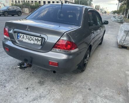 Сірий Міцубісі Lancer, об'ємом двигуна 1.6 л та пробігом 400 тис. км за 3493 $, фото 1 на Automoto.ua