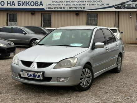 Серый Мицубиси Лансер, объемом двигателя 1.6 л и пробегом 280 тыс. км за 4600 $, фото 1 на Automoto.ua