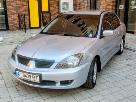 Сірий Міцубісі Lancer, об'ємом двигуна 1.6 л та пробігом 190 тис. км за 3999 $, фото 1 на Automoto.ua