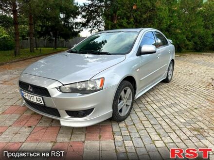 Серый Мицубиси Лансер, объемом двигателя 2 л и пробегом 250 тыс. км за 6000 $, фото 1 на Automoto.ua