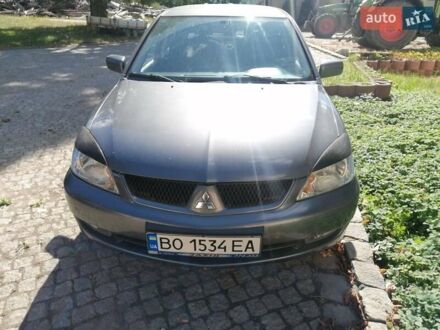 Сірий Міцубісі Lancer, об'ємом двигуна 1.6 л та пробігом 205 тис. км за 3800 $, фото 1 на Automoto.ua