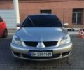 Сірий Міцубісі Lancer, об'ємом двигуна 1.3 л та пробігом 110 тис. км за 6200 $, фото 1 на Automoto.ua