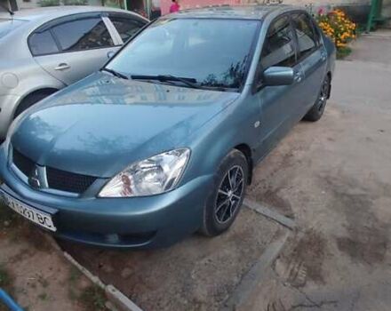 Сірий Міцубісі Lancer, об'ємом двигуна 1.6 л та пробігом 107 тис. км за 4900 $, фото 1 на Automoto.ua