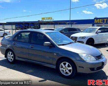 Сірий Міцубісі Lancer, об'ємом двигуна 1.6 л та пробігом 130 тис. км за 3999 $, фото 1 на Automoto.ua