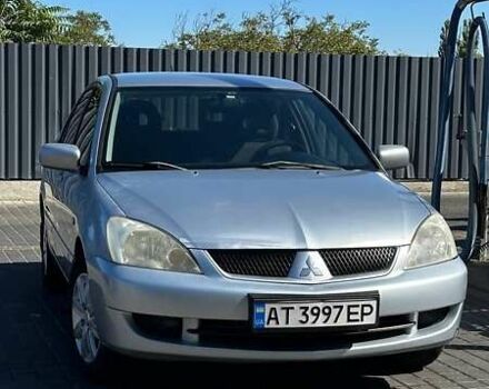 Сірий Міцубісі Lancer, об'ємом двигуна 1.6 л та пробігом 460 тис. км за 3350 $, фото 1 на Automoto.ua